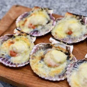 Ostión parmesano con coral 8 unidades